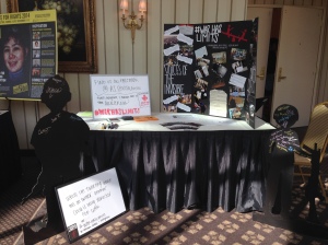 Our booth- complete with child soldier cutouts for people to sign.